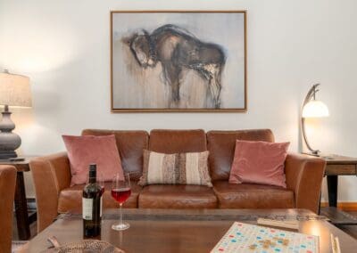 Leather Couch w buffalo picture frame